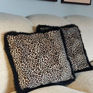 Two large leopard/ cheetah print throw pills